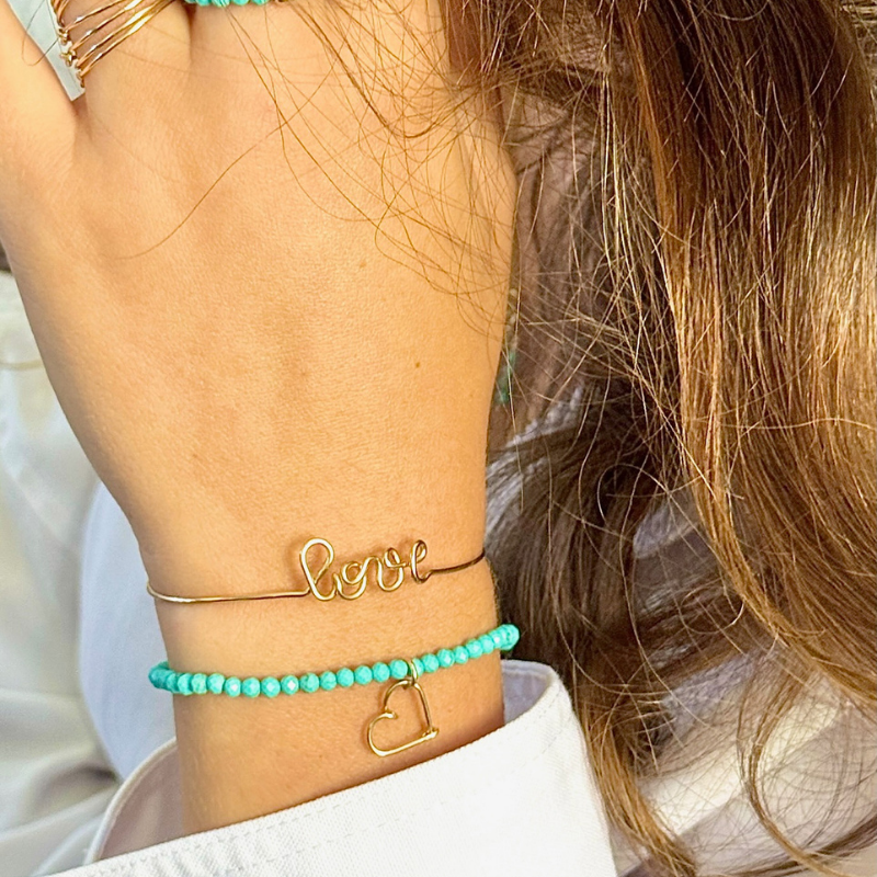 
                      
                        Bracelet élastique pierres, initiale
                      
                    